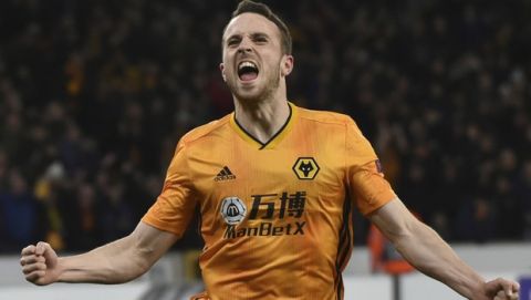 Wolverhampton Wanderers' Diogo Jota during the Europa League round of 32 match between Wolverhampton Wanderers and Espanyol at the Molineux Stadium, in Wolverhampton, England, Thursday Feb. 20, 2020. (AP Photo/ Rui Vieira)