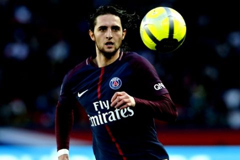 PSG's Adrien Rabiot runs after the ball during the French League One soccer match between Paris Saint-Germain and Metz at the Parc des Princes Stadium, in Paris, France, Saturday, March 10, 2018. (AP Photo/Thibault Camus)