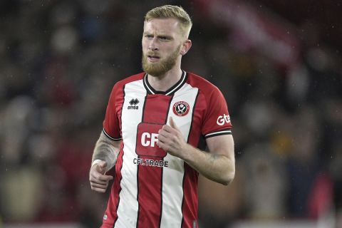 Sheffield United's Oliver McBurnie runs into position during the English Premier League soccer match between Sheffield United and Arsenal, at Bramall Lane Stadium in Sheffield, England, Monday, March 4, 2024. (AP Photo/Dave Shopland)