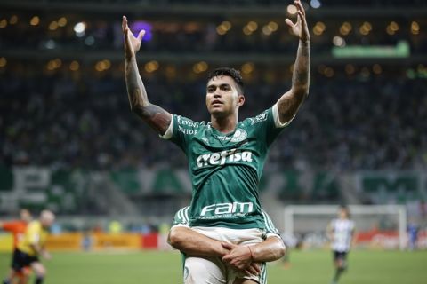 Palmeiras' Dudu celebrates after scoring against Santos during the Copa do Brasil final soccer match in Sao Paulo, Brazil, Wednesday, Dec. 2, 2015. Palmeiras won in a penalty shootout after an aggregate 2-2 draw.(AP Photo/Andre Penner)