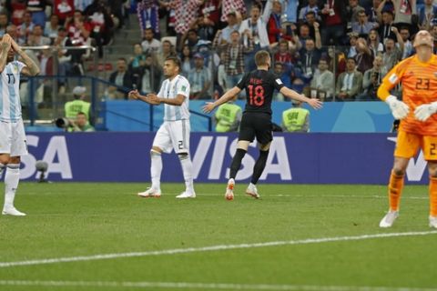 Croatia's Ante Rebic, second right, celebrates after scoring the opening goal during the group D match between Argentina and Croatia at the 2018 soccer World Cup in Nizhny Novgorod Stadium in Nizhny Novgorod, Russia, Thursday, June 21, 2018. (AP Photo/Ricardo Mazalan)