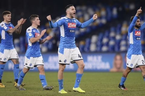 Napoli's Konstantinos Manolas, center, and his teammates celebrate the victory over Lazio during their Italian Cup Serie A quarterfinal soccer match at San Paolo stadium in Napoli, Italy, Tuesday, Jan. 21, 2020. (LaPresse via AP)
