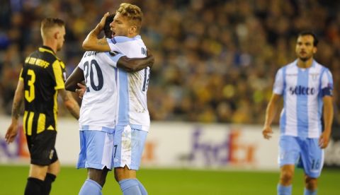 Lazio's Ciro Immobile, center right, is congratulated by Lazio's Felipe Caicedo after Immobile scored during a Europa League group K soccer match between Vitesse and Lazio at the Gelredome Arena in Arnhem, Netherlands, on Thursday, Sept. 14, 2017. (AP Photo/Peter Dejong)