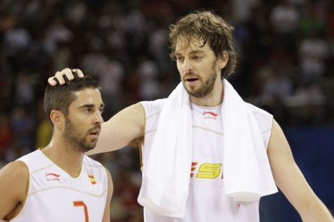 Spain's center Pau Gasol, right, celebrates with teammate Juan Carlos Navarro (7) after their win over Croatia in their men's quarterfinal  basketball game at the Beijing 2008 Olympics in Beijing, Wednesday, Aug. 20, 2008.  (AP Photo/Eric Gay)