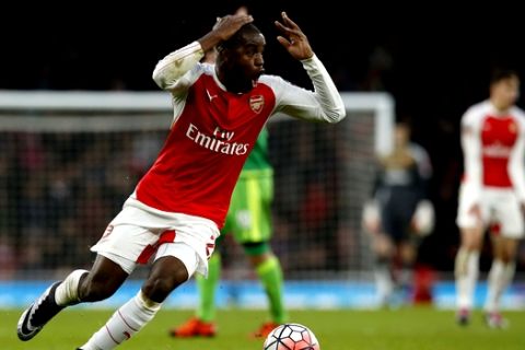 Arsenal's Joel Campbell reacts after giving away a foul during the English FA Cup third round soccer match between Arsenal and Sunderland at the Emirates stadium in London, Saturday, Jan. 9, 2016 . (AP Photo/Alastair Grant) 