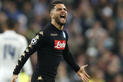 Napoli's Lorenzo Insigne celebrates after scoring the opening goal during the Champions League round of 16, first leg, soccer match between Real Madrid and Napoli at the Santiago Bernabeu stadium in Madrid, Wednesday Feb. 15, 2017. (AP Photo/Daniel Ochoa de Olza)
