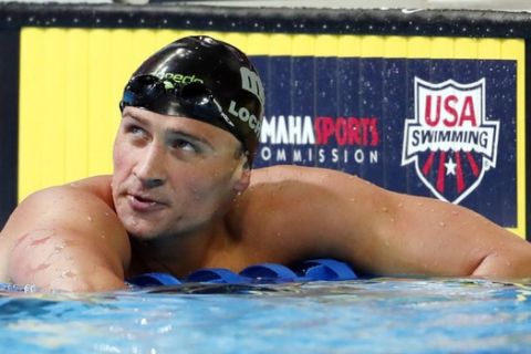 Jun 28, 2016; Omaha, NE, USA; Ryan Lochte reacts after the men's freestyle 200m finals in the U.S. Olympic swimming team trials at CenturyLink Center. Mandatory Credit: Rob Schumacher-USA TODAY Sports