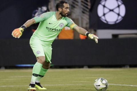 Manchester City goalkeeper Claudio Bravo in action during the first half of an International Champions Cup tournament soccer match against Liverpool, Wednesday, July 25, 2018, in East Rutherford, N.J. (AP Photo/Julio Cortez)