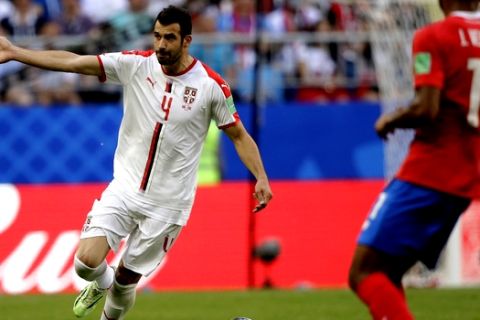 Serbia's Luka Milivojevic reacts next to Costa Rica's Johan Venegas during the group E match between Costa Rica and Serbia at the 2018 soccer World Cup in the Samara Arena in Samara, Russia, Sunday, June 17, 2018. (AP Photo/Mark Baker)