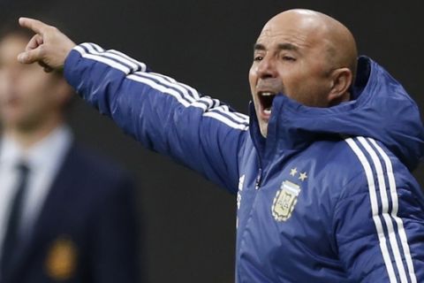 Argentina's coach Jorge Sampaoli gestures during the international friendly soccer match between Spain and Argentina at the Wanda Metropolitano stadium in Madrid, Spain, Tuesday, March 27, 2018. (AP Photo/Francisco Seco)