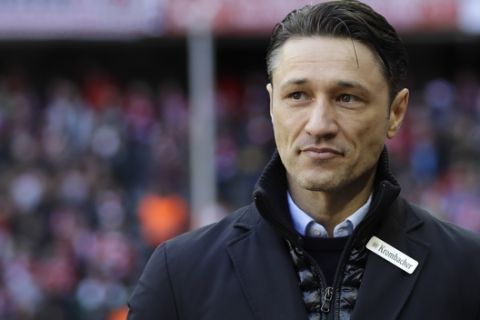 FILE - In this March 11, 2017 file photo Frankfurt's head coach Niko Kovac arrives for the German Soccer Bundesliga match between FC Bayern Munich and Eintracht Frankfurt at the Allianz Arena stadium in Munich, Germany. Two years after taking over relegation-threatened Eintracht Frankfurt, Niko Kovac is on the verge of taking the side into the Champions League. It would be the German clubs first appearance in Europes premier competition since the European Cup final in 1960.  (AP Photo/Matthias Schrader)