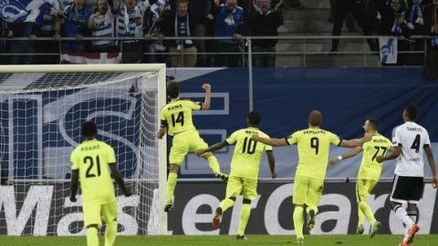 Ghent's Belgian midfielder Sven Kums (2nd L) celebrates after scoring the opening goal during the UEFA Champions League Group H second-leg football match between KAA Gent and Valencia CF at the KAA Gent Stadium in Ghent, Belgium on November 4, 2015. AFP PHOTO / JOHN THYS        (Photo credit should read JOHN THYS/AFP/Getty Images)