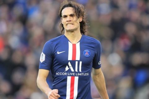 PSG's Edinson Cavani reacts after missing a scoring chance during the French League One soccer match between Paris-Saint-Germain and Dijon, at the Parc des Princes stadium in Paris, France, Saturday, Feb. 29, 2020. (AP Photo/Michel Euler)