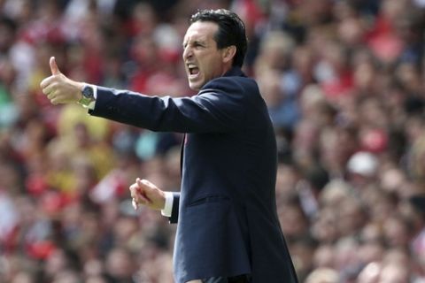 Arsenal manager Unai Emery gestures on the touchline, during the English Premier League soccer match between Arsenal and Burnley FC, at The Emirates Stadium, in London, Saturday, Aug. 17, 2019. (Yui Mok/PA via AP)