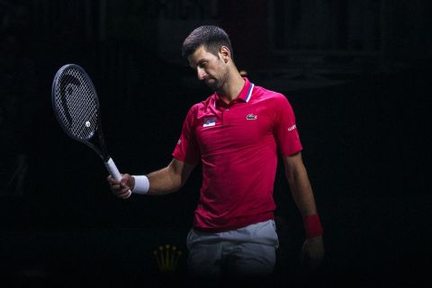 Novak Djokovic of Serbia reacts against Jannik Sinner of Italy during a Davis Cup semi-final tennis match between Italy and Serbia in Malaga, Spain, Saturday, Nov. 25, 2023. (AP Photo/Manu Fernandez)