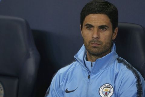 Manchester City's assistant coach Mikel Arteta ahead of the Champions League Group F soccer match between Manchester City and Lyon at the Etihad stadium in Manchester, England, Wednesday, Sept. 19, 2018. (AP Photo/Dave Thompson)
