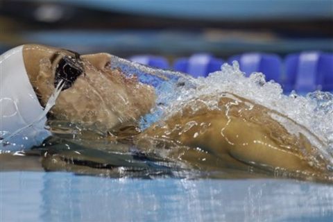 Greece's Theodora Drakou competes in a heat of the women's 50m Backstroke at the FINA Swimming World Championships in Shanghai, China, Wednesday, July 27, 2011. (AP Photo/Michael Sohn) 