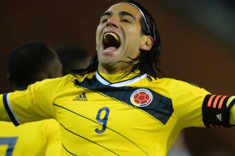 BRUSSELS, BELGIUM - NOVEMBER 14:  Radamel Falcao of Columbia celebrates scoring their first goal during the International Friendly match between Belgium and Columbia at King Baudouin Stadium on November 14, 2013 in Brussels, Belgium.  (Photo by Christopher Lee/Getty Images)