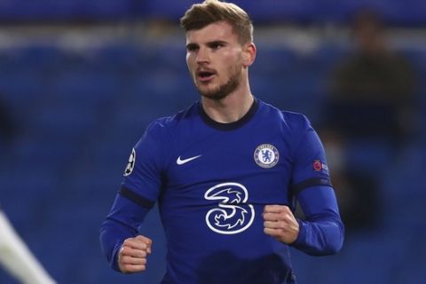 Chelsea's Timo Werner celebrates after scoring the opening goal during the Champions League Group E soccer match between Chelsea and Rennes at Stamford Bridge, London, England, Wednesday Nov. 4, 2020. (Clive Rose/Pool via AP)