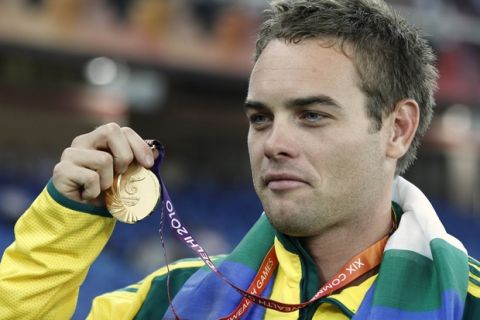Australia's Jarrod Bannister poses with his gold medal for the Men's Javelin during the Commonwealth Games at the Jawaharlal Nehru Stadium in New Delhi, India, Tuesday, Oct. 12, 2010. (AP Photo/Anja Niedringhaus)