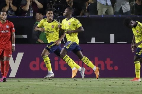 Arsenal's Eddie Nketiah, third from left, celebrates with teammates after scoring against Bayern Munich during the second half of an International Champions Cup soccer match Wednesday, July 17, 2019, in Carson, Calif. (AP Photo/Marcio Jose Sanchez)