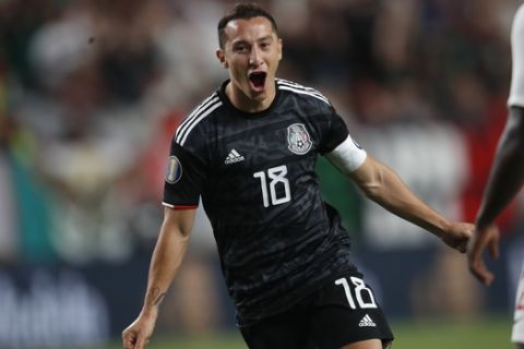 Mexico midfielder Andres Guardado reacts after scoring a goal against Canada during the second half of a CONCACAF Gold Cup soccer match Wednesday, June 19, 2019, at Mile High Stadium in Denver. Mexico won 3-1. (AP Photo/David Zalubowski)