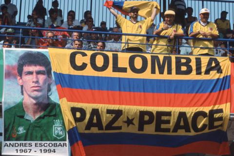 MONTPELLIER, FRANCE - JUNE 22: Fans of Colombia display a banner from Andres Escobar, who was murdered after the World Cup 1994, during the FIFA World Cup group d match between Colombia and Tunesia on June 22, 1998 in Montpellier, France.