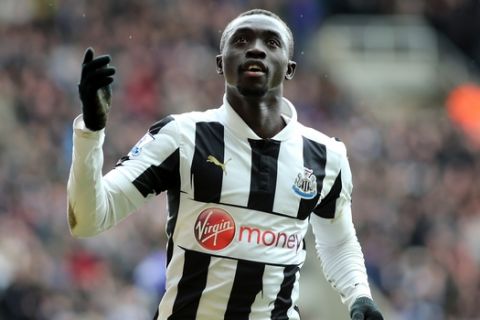 Newcastle United's Papiss Cisse celebrates after scoring his goal against Southampton during their English Premier League soccer match at St James' Park, Newcastle, England, Sunday, Feb. 24, 2013. (AP Photo/Scott Heppell)