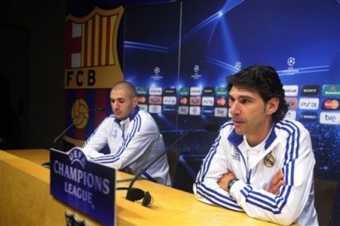 Real Madrid's second coach Aitor Karanka, right, and Karim Benzema, from France, attend a press conference at the Nou Camp stadium in Barcelona, Spain, Monday, May 2, 2011. FC Barcelona will play against Real Madrid on Tuesday in a semifinal, second leg Champions League soccer match. (AP Photo/Manu Fernandez)