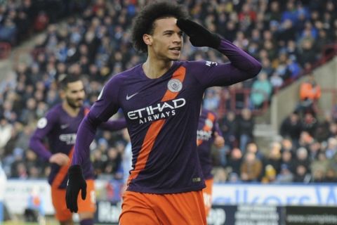 Manchester City's Leroy Sane celebrates after scoring the third goal for his team, during the English Premier League soccer match between Huddersfield Town and Manchester City at John Smith's stadium in Huddersfield, England, Sunday, Jan. 20, 2019. (AP Photo/Rui Vieira)