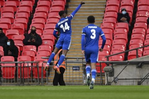 Leicester's Kelechi Iheanacho celebrates after scoring his side's opening goal during the English FA Cup semifinal soccer match between Leicester City and Southampton at Wembley Stadium in London, Sunday, April 18, 2021. (Neil Hall/Pool via AP)