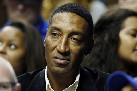 FILE - In this March 13, 2015, file photo, former NBA player Scottie Pippen watches the first half of an NCAA college basketball game in the quarter final round of the Southeastern Conference tournament between Kentucky and Florida, in Nashville, Tenn. A lawsuit has been dropped that alleged former Chicago Bulls star assaulted a man at a sushi restaurant in 2013. Pippen's attorney, Mark Geragos, said Saturday, Oct. 10, 2015, that a countersuit Pippen filed against Camran Shafighi is also being dropped. (AP Photo/Steve Helber, File)