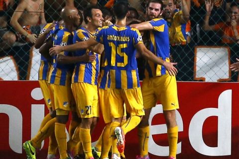 NICOSIA, CYPRUS - AUGUST 26:  Apoel Nicosia celebrate after scoring a goal during the  match between  Aalborg BK and Apoel Nicosia on August 26, 2014 in Nicosia, Cyprus.  (Photo by Andrew Caballero-Reynolds/Getty Images)