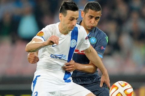 NAPLES, ITALY - MAY 7: Faouzi Ghoulam of Napoli vies with Nikola Kalinic of FC Dnipro Dnipropetrovsk during the UEFA Europa League Semi Final between SSC Napoli and FC Dnipro Dnipropetrovsk on May 7, 2015 in Naples, Italy.  (Photo by Francesco Pecoraro/Getty Images)