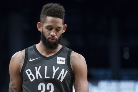 Brooklyn Nets guard Allen Crabbe stands on the court during the first half of an NBA basketball game against the Atlanta Hawks, Saturday, Dec. 2, 2017, in New York. (AP Photo/Mary Altaffer)