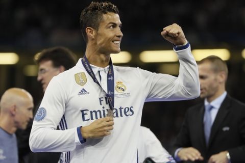 Real Madrid's Cristiano Ronaldo celebrates at the end of the Champions League soccer final between Juventus and Real Madrid at the Millennium Stadium in Cardiff, Wales, Saturday, June 3, 2017. (AP Photo/Kirsty Wigglesworth)