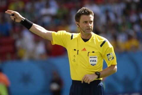 BRASILIA, BRAZIL - JULY 05: Referee Nicola Rizzoli in action during the 2014 FIFA World Cup Brazil Quarter Final match between Argentina and Belgium at Estadio Nacional on July 5, 2014 in Brasilia, Brazil. Argentina won the match 1-0. (Photo by Bob Thomas/Popperfoto/Getty Images)