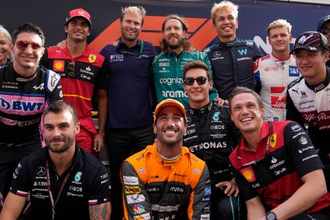 Aston Martin driver Sebastian Vettel, of Germany, top row center, poses for a picture with other drivers ahead of the Emirates Formula One Grand Prix, at the Yas Marina racetrack, in Abu Dhabi, United Arab Emirates, in Abu Dhabi, United Arab Emirates Sunday, Nov. 20, 2022. (AP Photo/Hussein Malla)