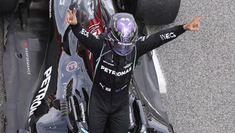 Mercedes driver Lewis Hamilton of Britain celebrates after winning the Spanish Formula One Grand Prix at the Barcelona Catalunya racetrack in Montmelo, just outside Barcelona, Spain, Sunday, May 9, 2021. (Lars Baron/Pool via AP)
