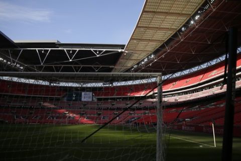 The empty stands of the Wembley Stadium ahead of the English Premier League soccer match between Tottenham Hotspur and Newcastle in London, Saturday, Feb. 2, 2019.(AP Photo/Tim Ireland)