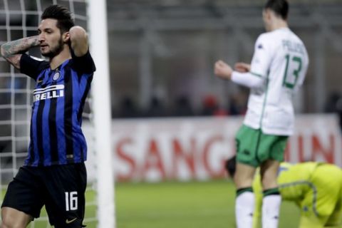 Inter Milan's Matteo Politano, left, reacts after missing a scoring chance during the Serie A soccer match between Inter Milan and Sassuolo, at the San Siro stadium in Milan, Italy, Saturday, Jan. 19, 2019. (AP Photo/Luca Bruno)