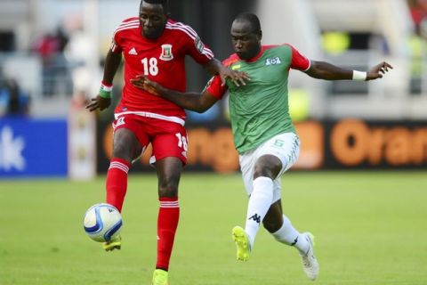 Viera Ellong Doualla of Equatorial Guinea and Djakaridja Kone of Burkina Faso during the 2015 Africa Cup of Nations football match between Equatorial Guinea and Burkina Faso at the Bata Stadium in Bata, Equatorial Guinea on 21 January 2015 ©Barry Aldworth/BackpagePix

