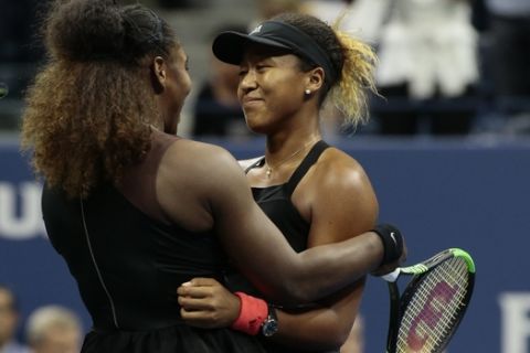 Naomi Osaka, of Japan, is hugged by Serena Williams after Osaka defeating Williams in the women's final of the U.S. Open tennis tournament, Saturday, Sept. 8, 2018, in New York. (AP Photo/Andres Kudacki)