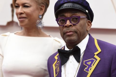 Tonya Lewis Lee, left, and Spike Lee arrive at the Oscars on Sunday, Feb. 9, 2020, at the Dolby Theatre in Los Angeles. (Photo by Jordan Strauss/Invision/AP)