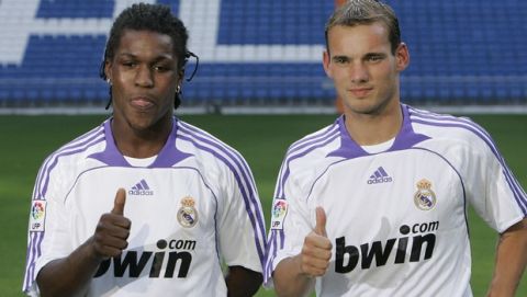 Soccer players Royston Drenthe, left, and Wesley Sneijder both from Netherlands, pose during their official presentation as new Real Madrid players in the Santiago Bernabeu Stadium in Madrid, Monday Aug. 13, 2007. The two players will join Dutch striker Ruud van Nistelrooy, who scored a league-high 25 goals last season, at Madrid. (AP Photo/Bernat Armangue)