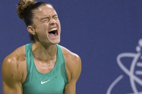 Maria Sakkari, of Greece, reacts after losing a point to Danielle Collins, of the United States, during the semifinals of the Mubadala Silicon Valley Classic tennis tournament in San Jose, Calif., Saturday, Aug. 4, 2018. Sakkari won 3-6, 7-5, 6-2. (AP Photo/John Hefti)