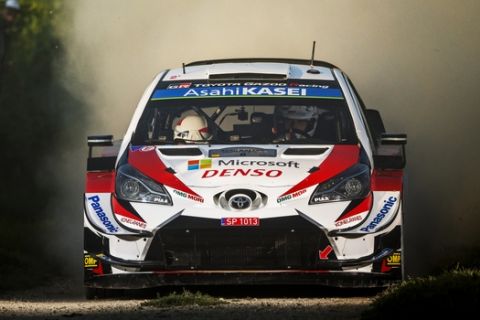 Ott Tänak won his third consecutive ADAC Rallye Deutschland on August 25 to take another huge stride towards a maiden FIA World Rally Championship title. He survived a late scare to claim his fourth victory in five rounds, leading Toyota to their first clean sweep of the podium since 1993 and the first in the WRC since this rally four years ago. Brake problems on his Toyota Yaris in the penultimate speed test forced Tänak to drive cautiously through the closing Wolf Power Stage, but he had enough in hand to head Kris Meeke by 20.8sec with Jari-Matti Latvala a further 15.2sec behind. The Estonian extended his championship lead to 33 points with four rounds remaining. The four-day encounter was fought out on bumpy vineyard tracks in the Mosel, gruelling multi-surface tank training roads and smooth country lanes in the Saarland countryside. // Ott Tänak (winner, EST) and Martin Jarveoja (EST) of team Toyota Gazoo Racing WRT race during World Rally Championship Germany in Bostalsee, Germany on August 25, 2019. // Jaanus Ree / Red Bull Content Pool via AP Images  // For more content, pictures and videos like this please go to http://www.redbullcontentpool.com