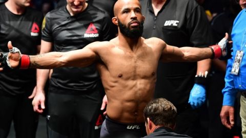Apr 15, 2017; Kansas City, MO, USA; Demetrious Johnson (Red Gloves) before the fight against Wilson Reis (not pictured) during UFC Fight Night at Sprint Center. Mandatory Credit: Ron Chenoy-USA TODAY Sports
