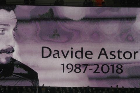 An image of Fiorentina captain Davide Astori is projected on a giant screen prior to the Champions League, round of 16, second-leg soccer match between Juventus and Tottenham Hotspur, at the Wembley Stadium in London, Wednesday, March 7, 2018. Fiorentina captain Davide Astori was found dead in his hotel room on Sunday at the age of 31 after a suspected cardiac arrest before an Italian league match. (AP Photo/Kirsty Wigglesworth)