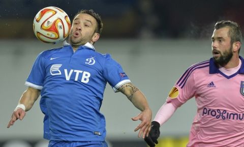 Dinamo Moscow's midfielder from France Mathieu Valbuena (L) gets the ball during the UEFA Europa League round of 32 match between FC Dinamo Moscow and RSC Anderlecht in Khimki outside Moscow on February 26, 2015. AFP PHOTO / YURI KADOBNOV        (Photo credit should read YURI KADOBNOV/AFP/Getty Images)